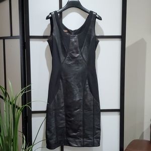 Fitted black leather dress